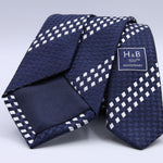 Holliday &amp; Brown - 100th Anniversary Collection
100%&nbsp;Woven Jacquard Silk
Tipped

Blue and White motif tie
Handmade in Italy

7.5 cm x 148 cm
#10044