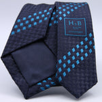 Holliday &amp; Brown - 100th Anniversary Collection
100%&nbsp;Woven Jacquard Silk
Tipped

Blue and Sky Blue motif tie
Handmade in Italy

7.5 cm x 148 cm
#10045