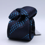 Holliday &amp; Brown - 100th Anniversary Collection
100%&nbsp;Woven Jacquard Silk
Tipped

Blue and Sky Blue motif tie
Handmade in Italy

7.5 cm x 148 cm
#10045