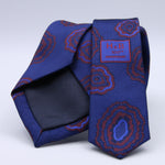 Holliday &amp; Brown - 100th Anniversary Collection
100%&nbsp;Woven Jacquard Silk
Tipped

Royal Blue and Rust motif tie
Handmade in Italy

7.5 cm x 148 cm
#10049