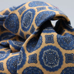 Cruciani &amp; Bella

60% Linen, 40% Silk&nbsp;
Italian fabric

Unlined tie
Sand Beige and Blue Motifs printed tie
Handmade in Italy
8 cm x 150 cm
#10081