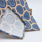 Cruciani &amp; Bella

60% Linen, 40% Silk&nbsp;
Italian fabric

Unlined tie
Sand Beige and Blue Motifs printed tie
Handmade in Italy
8 cm x 150 cm
#10081