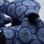 Cruciani &amp; Bella

60% Linen, 40% Silk&nbsp;
Italian fabric

Unlined tie
Blue, Sky Blue and Grey Motifs printed tie
Handmade in Italy
8 cm x 150 cm
#10082