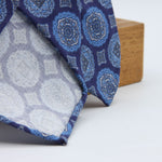 Cruciani &amp; Bella

60% Linen, 40% Silk&nbsp;
Italian fabric

Unlined tie
Blue, Sky Blue and Grey Motifs printed tie
Handmade in Italy
8 cm x 150 cm
#10082