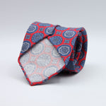 Cruciani &amp; Bella

60% Linen, 40% Silk&nbsp;
Italian fabric

Unlined tie
Red, Blue and Grey Motifs printed tie
Handmade in Italy
8 cm x 150 cm
#10083