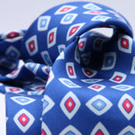 Cruciani &amp; Bella
100% Silk
Self-Tipped
Royal Blue, Light Red, White and Light Blue Motif Tie
Handmade and Printed in &nbsp;Italy
English Archive Motif
8 cm x 150 cm
#10093