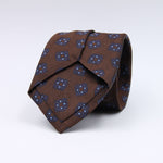 Cruciani &amp; Bella
100% Woven Jacquard Silk
Self-Tipped
Brown, Blue and Light Blue Motif Tie
Made in Italy
8 x 150 cm
#10104