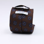 Cruciani &amp; Bella
100% Woven Jacquard Silk
Self-Tipped
Brown, Blue and Light Blue Motif Tie
Made in Italy
8 x 150 cm
#10104