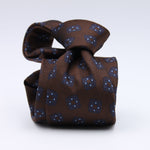 Cruciani &amp; Bella
100% Woven Jacquard Silk
Self-Tipped
Brown, Blue and Light Blue Motif Tie
Made in Italy
8 x 150 cm
#10104