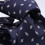 Cruciani &amp; Bella
100% Woven Jacquard Silk
Self-Tipped
Blue, Pink and White Motif Tie
Made in Italy
8 x 150 cm
#10106