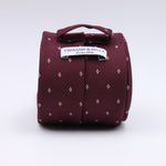 Cruciani &amp; Bella
100% Woven Jacquard Silk
Self-Tipped
Red Wine and White Motif Tie
Made in Italy
8 x 150 cm
#10107