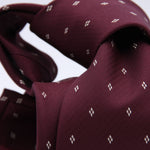 Cruciani &amp; Bella
100% Woven Jacquard Silk
Self-Tipped
Red Wine and White Motif Tie
Made in Italy
8 x 150 cm
#10107