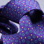 Cruciani &amp; Bella
100% Printed Silk

Self-Tipped
Purple, Blue and Yellow motif Tie&nbsp;
Handmade in Rome, Italy.

8 cm x 152 cm
#10150