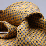 Cruciani &amp; Bella
100% Printed Silk

Self-Tipped
Yellow, White and Blue motif Tie&nbsp;
Handmade in Rome, Italy.

8,5 cm x 152 cm
#10162