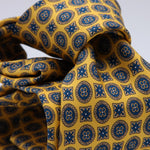 Cruciani &amp; Bella
100% Printed Silk

Self-Tipped
Yellow and Blue motif Tie&nbsp;
Made in Rome, Italy.

8 cm x 150 cm
#10206