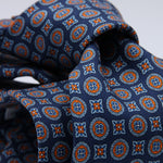 Cruciani &amp; Bella
100% Printed Silk

Self-Tipped
Blue and Orange motif Tie&nbsp;
Made in Rome, Italy.

8 cm x 150 cm
#10208