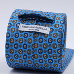 Cruciani &amp; Bella
100% Printed Silk

Self-Tipped
Light Blue, Brown and Navy Blue motif Tie&nbsp;
Made in Rome, Italy.

8 cm x 150 cm
#10210