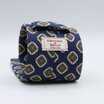 Cruciani &amp; Bella

60% Linen, 40% Silk&nbsp;
Italian fabric

Unlined tie
Blue, Green and Light Beige printed motif tie
Handmade in Italy
8 cm x 150 cm
#10077