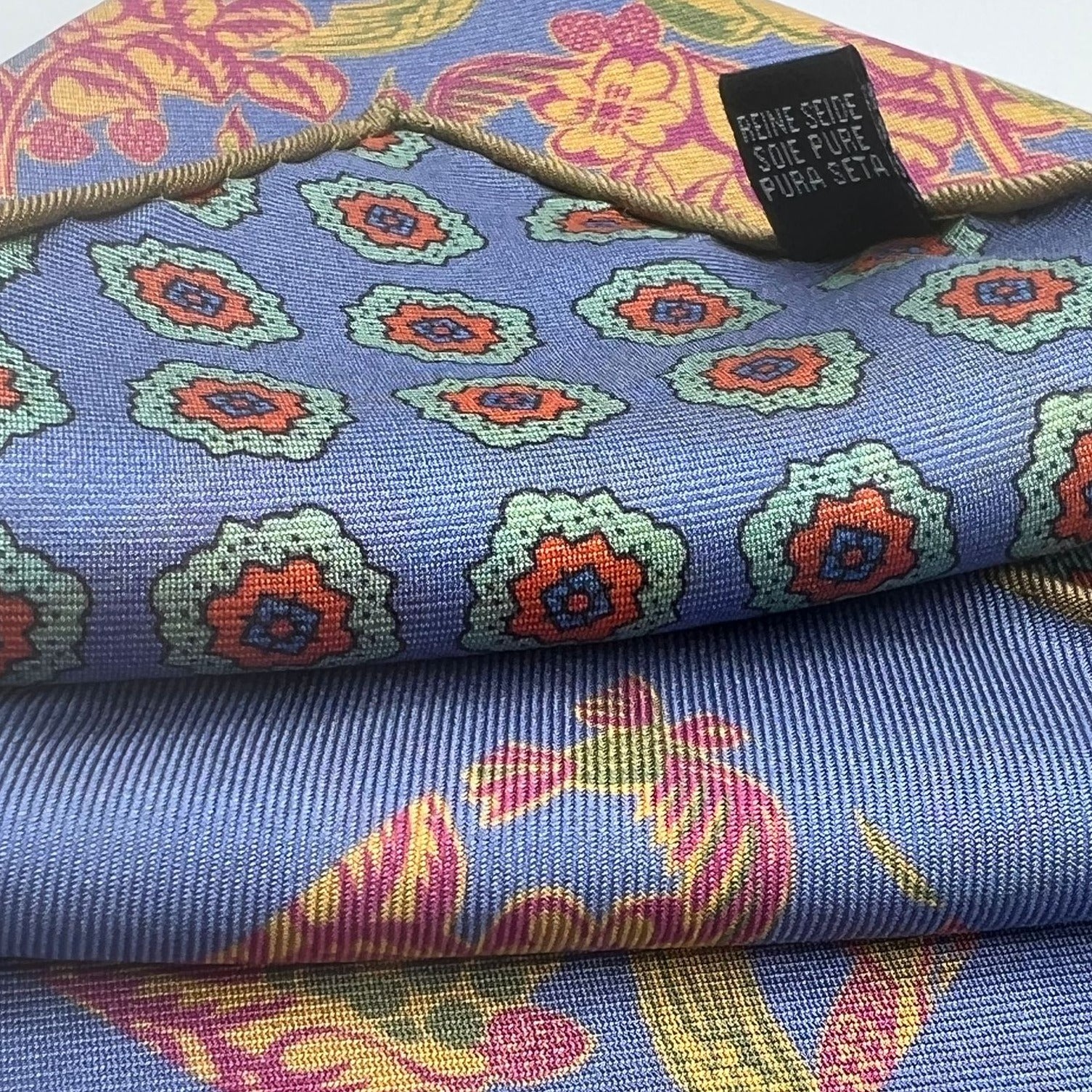 Cruciani & Bella Hand-rolled   100% Silk Light Blue, Orange and Light Green Double Faces Patterned  Motif  Pocket Square Made in England 32 cm X 32 cm