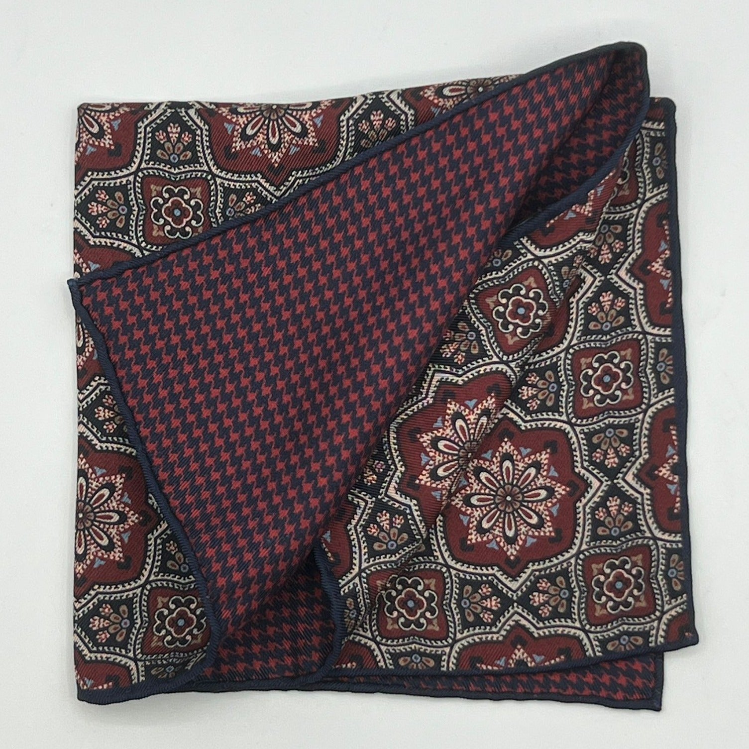 Holliday & Brown Hand-rolled   Holliday & Brown for Cruciani & Bella 100% Silk Light Brown, Blue, Red and Off White  Double Faces Patterned  Motif  Pocket Square Handmade in Italy 32 cm X 32 cm