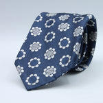 Cruciani &amp; Bella
100% Woven Silk Jacquard
Unlined
Seven Folds
Denim Blue and Off-White motif tie
Handmade in Italy
8 cm x 149 cm
#3104