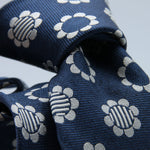 Cruciani &amp; Bella
100% Woven Silk Jacquard
Unlined
Seven Folds
Denim Blue and Off-White motif tie
Handmade in Italy
8 cm x 149 cm
#3104