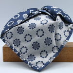 Cruciani &amp; Bella
100% Woven Silk Jacquard
Unlined
Seven Folds
Denim Blue and Off-White motif tie
Handmade in Italy
8 cm x 149 cm
#3104