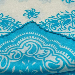 <ul> <li data-mce-fragment="1">Cruciani &amp; Bella</li> <li data-mce-fragment="1">100% Printed Silk&nbsp;</li> <li data-mce-fragment="1">Hand-rolled</li> <li data-mce-fragment="1">Turquoise, White Floral Motif Pocket Square</li> <li data-mce-fragment="1">Handmade in England<br data-mce-fragment="1"></li> <li data-mce-fragment="1">32 cm &nbsp;X 32 cm</li> </ul>