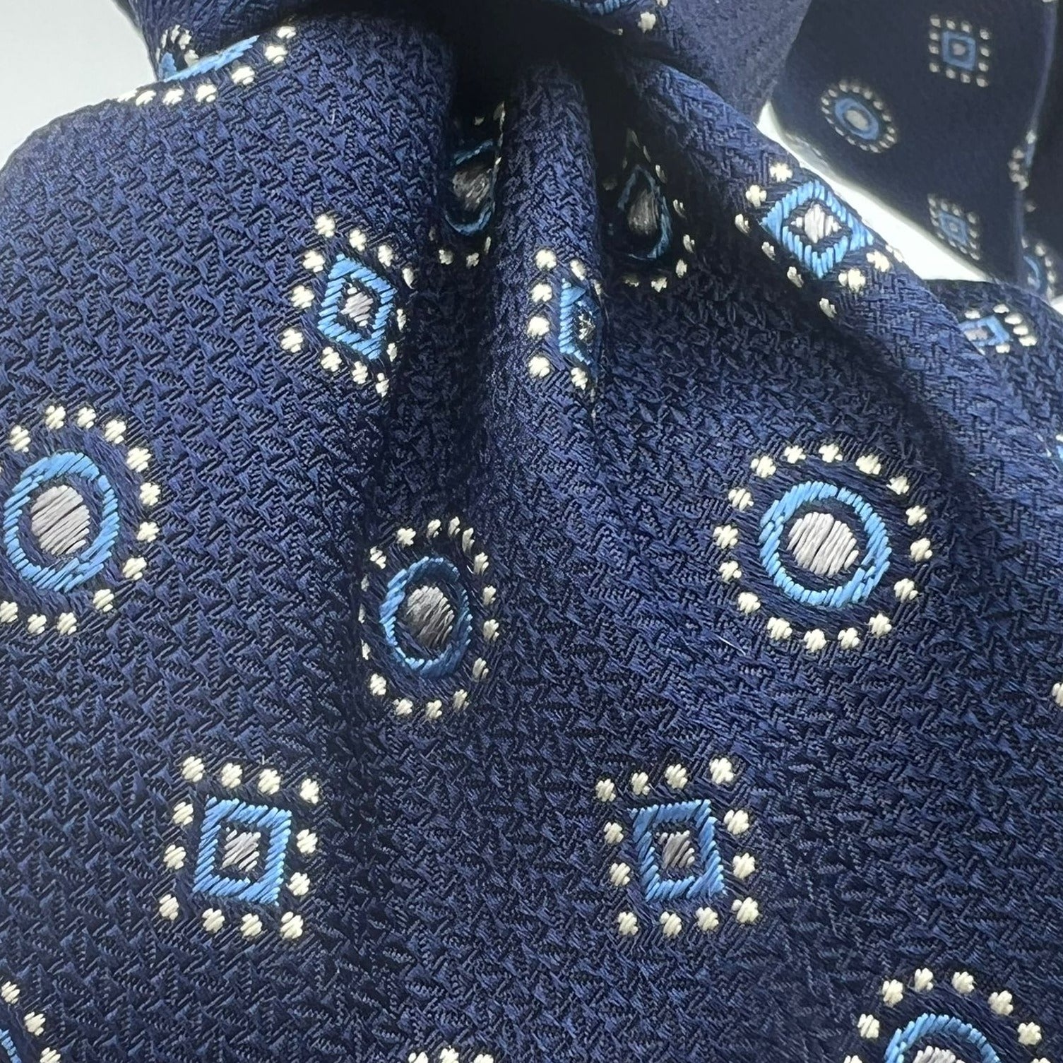 Drake's for Cruciani & Bella 100%  Woven Silk Jacquard Tipped Blue, Light Blue and White Motif Tie Handmade in London, England 9 cm x 148 cm #5384