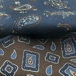 Holliday & Brown Hand-rolled   Holliday & Brown for Cruciani & Bella 100% Silk Brown, Blue and Light Blue Double Faces Patterned  Motif  Pocket Square Handmade in Italy 32 cm X 32 cm