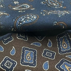 Holliday & Brown Hand-rolled   Holliday & Brown for Cruciani & Bella 100% Silk Brown, Blue and Light Blue Double Faces Patterned  Motif  Pocket Square Handmade in Italy 32 cm X 32 cm