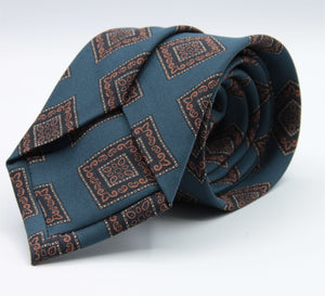 Holliday &amp; Brown for Cruciani &amp; Bella
100% printed Madder Silk
Self Tipped
Denim Blue, Brown, Dark Blue and Yellow motif Tie
Handmade in Italy
8 cm x 150 cm
#8955
