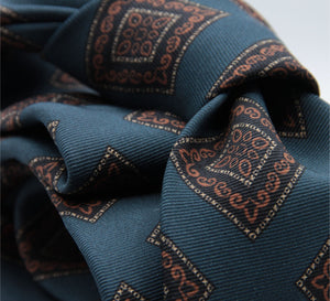 Holliday &amp; Brown for Cruciani &amp; Bella
100% printed Madder Silk
Self Tipped
Denim Blue, Brown, Dark Blue and Yellow motif Tie
Handmade in Italy
8 cm x 150 cm
#8955