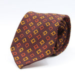 Cruciani &amp; Bella
Printed and Handmade in Italy
100% Wool
Unlined
Burgundy, Orange and Gold Yellow Motif Tie
8 cm x 150 cm
#9164