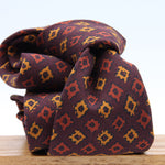 Cruciani &amp; Bella
Printed and Handmade in Italy
100% Wool
Unlined
Burgundy, Orange and Gold Yellow Motif Tie
8 cm x 150 cm
#9164