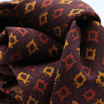 Cruciani &amp; Bella
Printed and Handmade in Italy
100% Wool
Unlined
Burgundy, Orange and Gold Yellow Motif Tie
8 cm x 150 cm
#9164