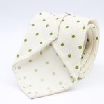 Cruciani &amp; Bella
Printed and Handmade in Italy
100% Wool
Unlined
Off-White and Green Dots Motif Tie
8 cm x 150 cm
#9171