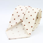 Cruciani &amp; Bella
Printed and Handmade in Italy
100% Wool
Unlined
Off-White and Brown Dots Motif Tie
8 cm x 150 cm
#9173