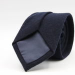 Holliday &amp; Brown for Cruciani &amp; Bella
90% Wool - 10% Silk
Tipped

Dark Blue Plain tie
Handmade in Italy

8 cm x 150 cm
#9589