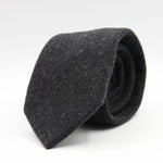 Holliday &amp; Brown for Cruciani &amp; Bella
90% Wool - 10% Silk
Tipped

Dark Grey Plain tie
Handmade in Italy

8 cm x 150 cm
#9593