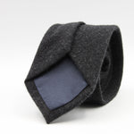 Holliday &amp; Brown for Cruciani &amp; Bella
90% Wool - 10% Silk
Tipped

Dark Grey Plain tie
Handmade in Italy

8 cm x 150 cm
#9593