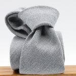 Holliday &amp; Brown for Cruciani &amp; Bella
90% Wool - 10% Silk
Tipped

Light Grey Plain tie
Handmade in Italy

8 cm x 150 cm
#9668