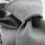 Holliday &amp; Brown for Cruciani &amp; Bella
90% Wool - 10% Silk
Tipped

Light Grey Plain tie
Handmade in Italy

8 cm x 150 cm
#9668
