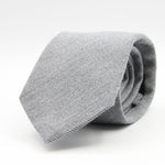 Holliday &amp; Brown for Cruciani &amp; Bella
90% Wool - 10% Silk
Tipped

Light Grey Plain tie
Handmade in Italy

8 cm x 150 cm
#9668