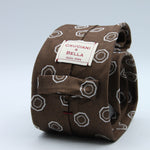 Cruciani &amp; Bella
100% Woven Silk Jacquard
Unlined
Seven Folds
Brown and Off-White motif tie
Handmade in Italy
8 cm x 149 cm
#9678