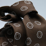 Cruciani &amp; Bella
100% Woven Silk Jacquard
Unlined
Seven Folds
Brown and Off-White motif tie
Handmade in Italy
8 cm x 149 cm
#9678