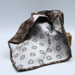 Cruciani &amp; Bella
100% Woven Silk Jacquard
Unlined
Seven Folds
Brown and Off-White motif tie
Handmade in Italy
8 cm x 149 cm
#9678