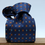 Cruciani &amp; Bella
100% Silk
Self-Tipped
Navy Blue, Rust and Light Blue Motif Tie
Handmade and Printed in &nbsp;Italy
English Archive Motif
8 cm x 150 cm
#9718
