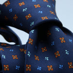 Cruciani &amp; Bella
100% Silk
Self-Tipped
Navy Blue, Rust and Light Blue Motif Tie
Handmade and Printed in &nbsp;Italy
English Archive Motif
8 cm x 150 cm
#9718