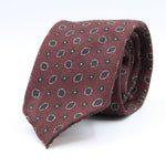 Cruciani &amp; Bella
Printed and Handmade in Italy
100% Wool
Unlined
Rust, Beige and Blue Motif Tie
8 cm x 150 cm
#9745